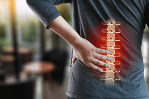 Man with inflamed back due to Ankylosing Spondylitis